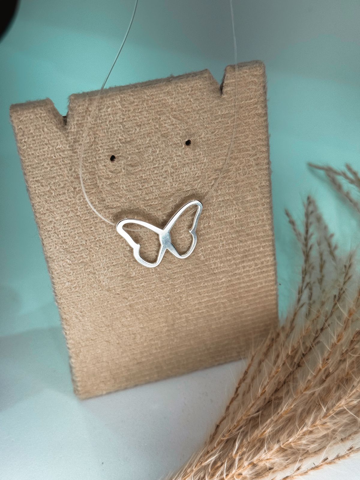 GAGANTILHA FIO NYLON BORBOLETA VAZADA